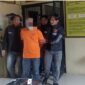 Tersangka JN (47) saat keluar dari ruang tahanan Polres Gayo Lues, Jumat (21/11/2025) |doc|insetgalusnews|
